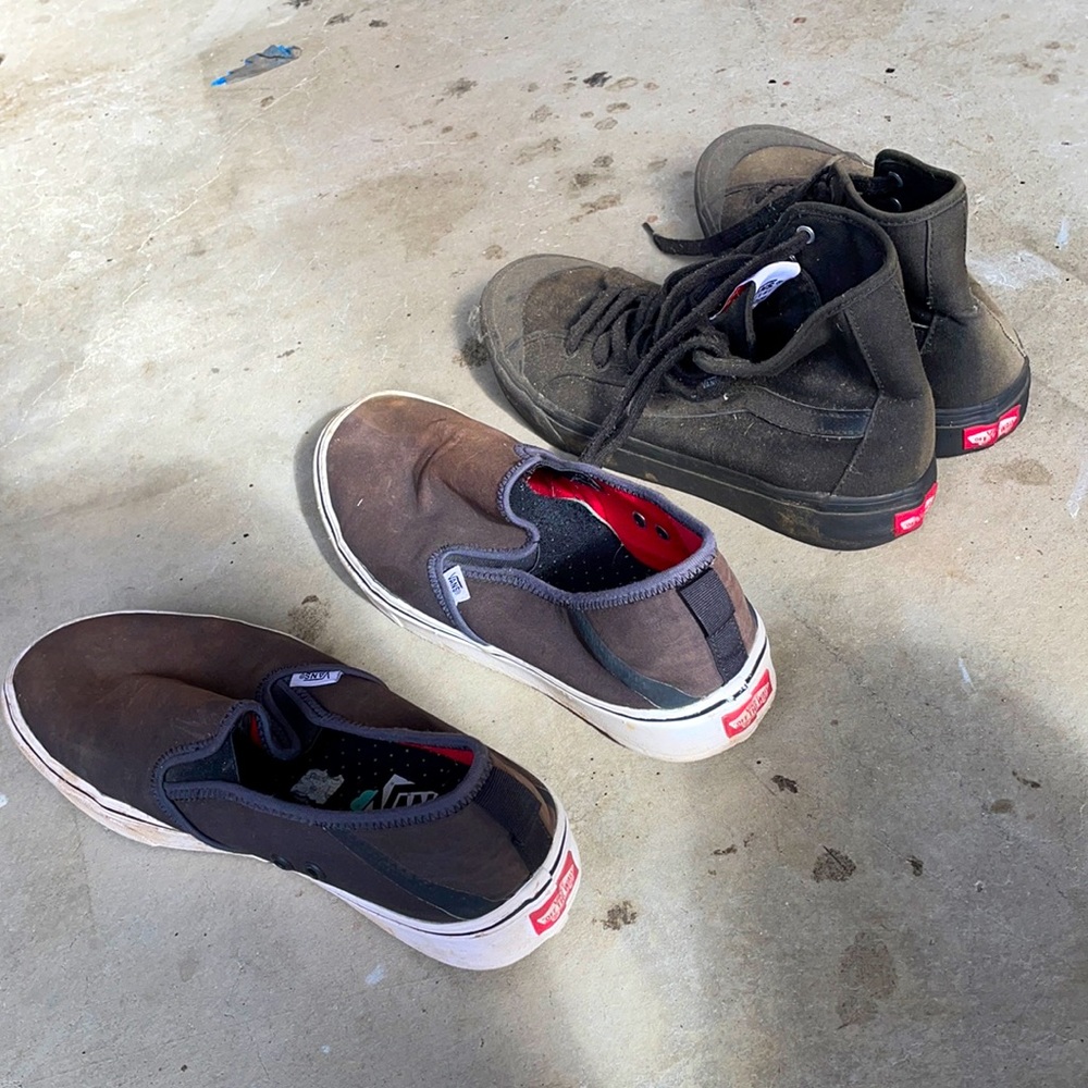 Vans black slip ons and midtops
